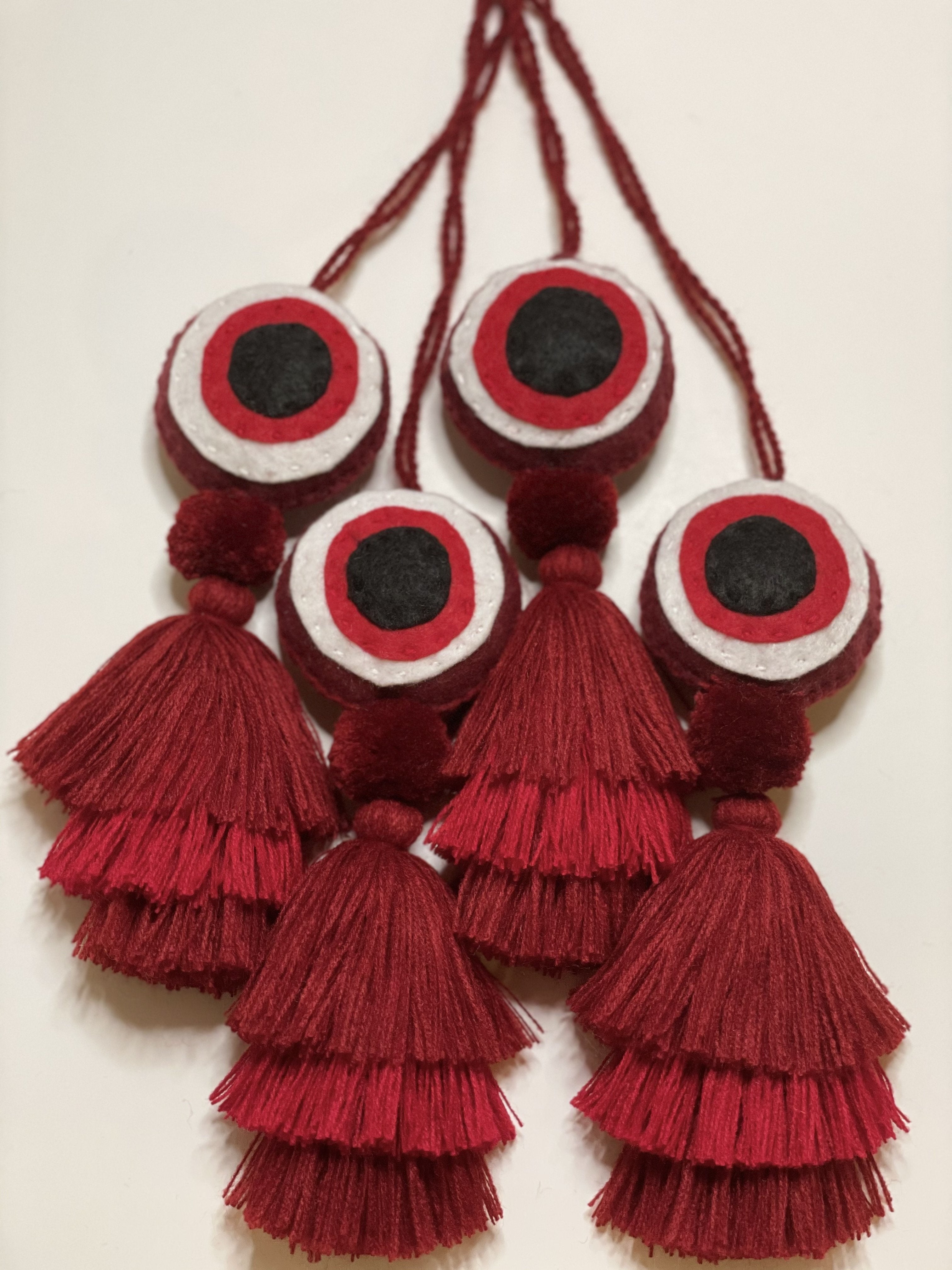 MAL DE OJO TASSEL